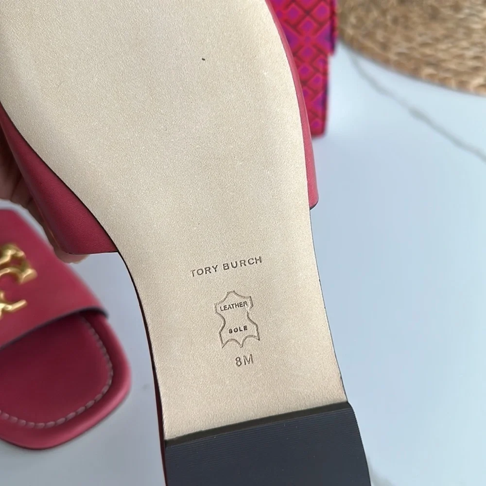 Tory Burch emblems raised sophisticated